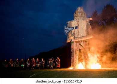 Waterlooville, Hampshire / UK - April 29 2017: Celebrations of the Pagan Spring Beltain (Beltane) Festival at Butser Ancient Farm the Wicker Man is burnt and historic crafts and dances are performed.