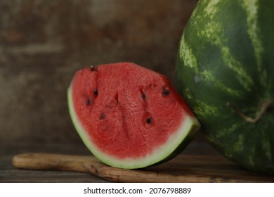 Watermellon Slices On Wooden Background