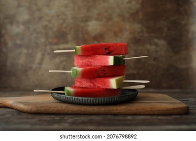 Watermellon Slices On Wooden Background