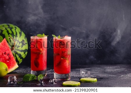 Watermelon alcoholic or non-alcoholic cocktail, mojito cocktail with mint and lime.
