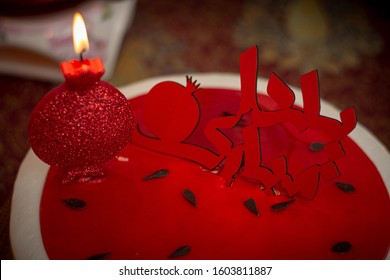 A Watermelon Cake In Red With A Pomegranate Candle In Celebration Of Yalda Night ( The Longest Year Of The Night In Persian Culture) The Sign Says : 