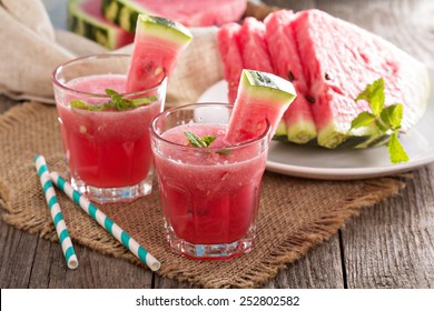 Watermelon drink in glasses with slices of watermelon
