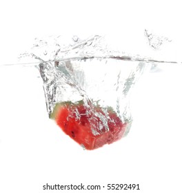 Watermelon falling in water