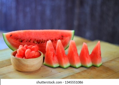 watermelon heart shape in wooden bowl