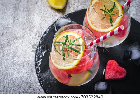 Watermelon lemon cocktail with pieces of watermelon in shape of heart. Valentine's Day Concept