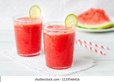 Watermelon lemonade with lime and fresh mint leaves. Refreshing summer drink