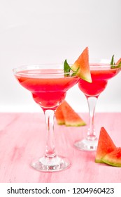 Watermelon Margarita Cocktail On Pink Background. Fresh Watermelon Lemonade With Mint And  Ice For Summer Party. Refreshing Summer Drink.