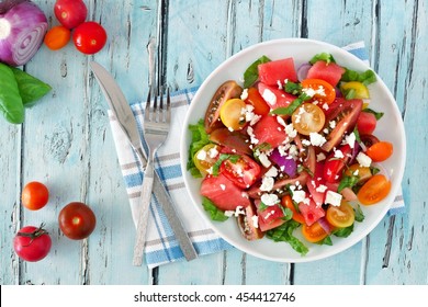 Watermelon And Mixed Tomato Salad With Feta Cheese, Overhead Scene On Rustic Blue Wood