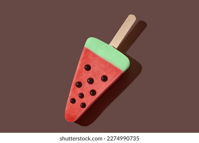 Watermelon popsicle ice cream on brown pastel background. - Powered by Shutterstock