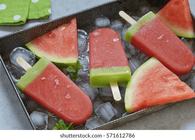 Watermelon Popsicle With Ice Cubes On Tray