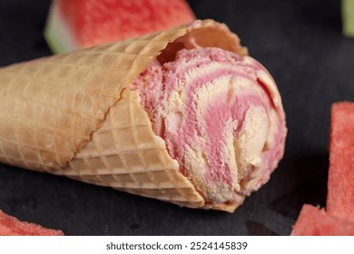 watermelon red ice cream with slices of ripe red watermelon, red watermelon and ice cream on a black slate board close-up - Powered by Shutterstock