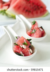 Watermelon Salsa With Red Onion In Two Spoons