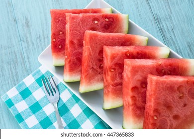 Watermelon slices on a plate in summertime