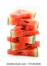 Watermelon slices stacked on white background.