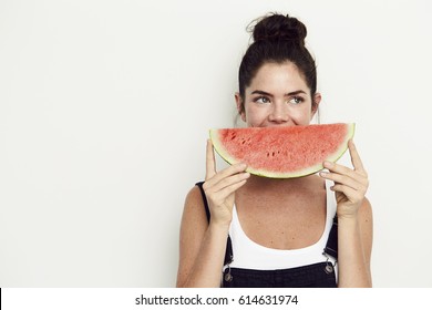 Watermelon Smile On Young Woman, Looking Away