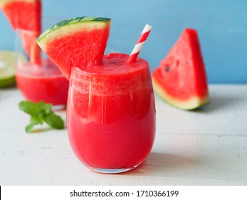 Watermelon smoothies topping with fresh watermelon for summer drinks concept.