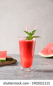 Watermelon Summer Cocktail Garnish Mint On Grey Background. Close Up. Vertical Format.