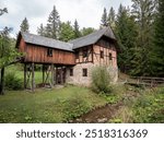 The watermill and sawmill building in the open-air museum of the Kysuck village in Nova Bystrica-Vychylovka. The mill and saw were set in motion by a wheel driven by running water.