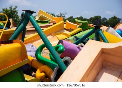 Waterpark debris with colorful details, Otres village, Cambodia. Kids park debris with funny character. Sianoukville attraction destroyed. Aquapark debris and spare parts. Colorful toy land details