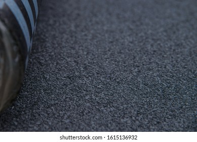 Waterproof bitumen roll covered with insulation materials, abstract background, closeup texture