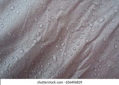 The waterproof fabric, water dropscloth. Waterproof Clothing, Textile, Water. Waterproof fabric with waterdrops.