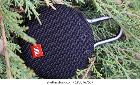 Waterproof round Bluetooth-speakers JBL Clip 3 in black color with a carabiner. Digital music and audio concept. Mini, suitable for travel. Ukraine, Kiev - June 09, 2021