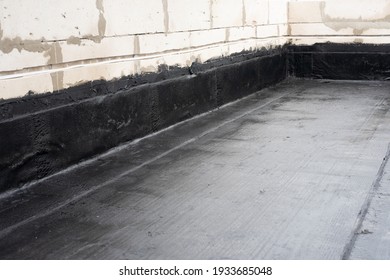 Waterproofing Flat Roof Terrace With Roll Bitumen. Roof Waterproofing. Bitumen Insulating Layer. Covering Roofing Material. Flat Roof Installation. Roofing Felt