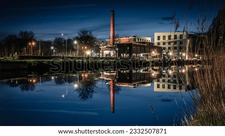 Waterreflections at the Reitdiep in Groningen, a view to the old Milkfactory