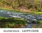 Waters from Welch Spring join the Current River, near Jadwin, Missouri, MO, United States, US, USA.  Welch Spring is the 6th largest spring in Missouri and is a part of the National Park Service.