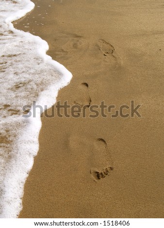 Water,sand and footprints