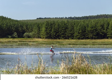 Water-Skiing Mountain Landscape
Teenager Boy Slalom Water-skiing Mountain Lake Summer Landscape.