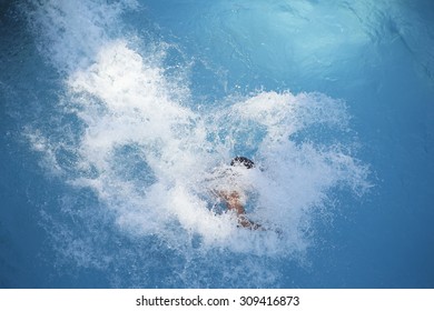 Waterslide Fun, Big Splash, Refreshing Water. View From Above