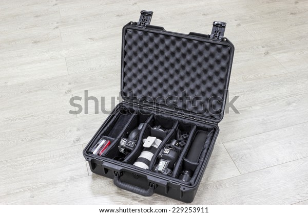 Watertight protector plastic case with photo\
equipments inside