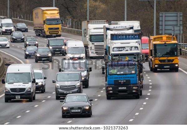 WATFORD, UK - FEBRUARY 8, 2018: Afternoon\
traffic on the busiest British motorway\
M25