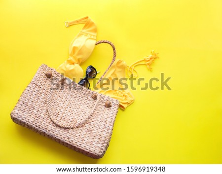 Similar – Foto Bild Tasche mit Damenstrand oder Sommeroutfit im Inneren