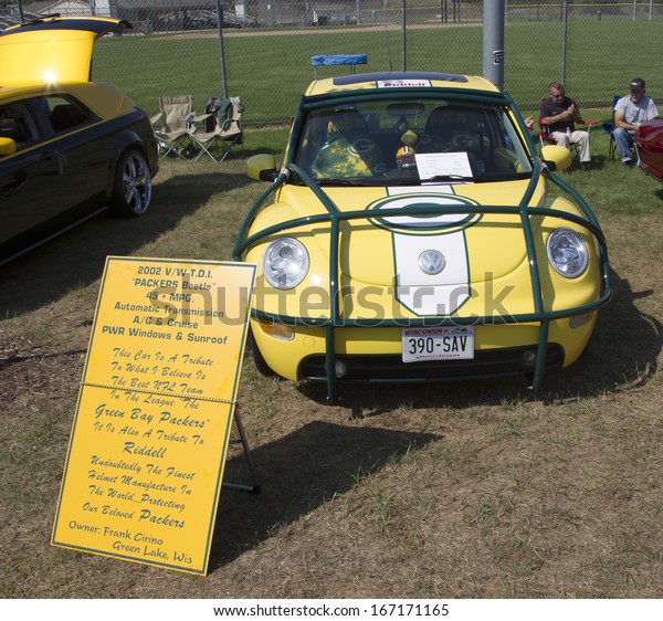 WAUPACA, WI - AUGUST 24:  2002 Green Bay\
Packers VW Beetle Car at Waupaca Rod and Classic Annual Car Show\
August 24, 2013 in Waupaca,\
Wisconsin.