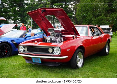 Wausau, Wisconsin / USA - June 28th, 2020: 1960s 427 Red Chevrolet Camaro Sits At Willow Springs Garden Vintage Car Show. 