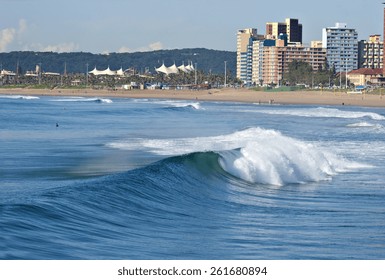 A Wave Breaks Along The Golden Mile In Durban, South Africa.