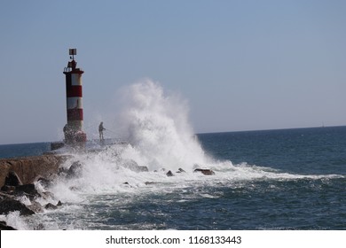Wave on lighthouse
