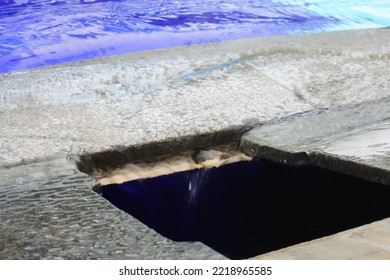 Wave Pool Water With Blue Floor Mat And Reflection Of Stripes