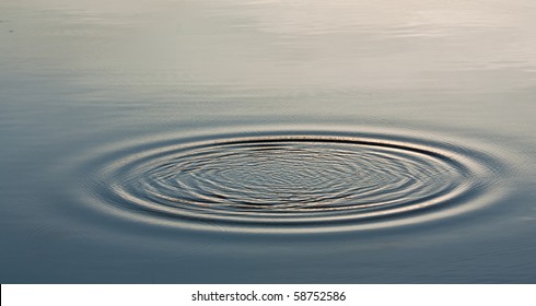 Wave Ripple Circle On The Lake