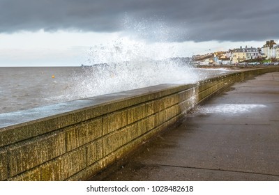 Wave Slashes Over A Wall In Herne Bay, Kent, Uk On A Stormy Windy Day Winter Day.