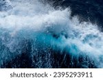 Wave splash created by an expedition cruise ship crossing the Drake passage en-route to Antarctica 