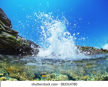 Wave Splash In The Ocean Against Beach Reef / Wave Splash