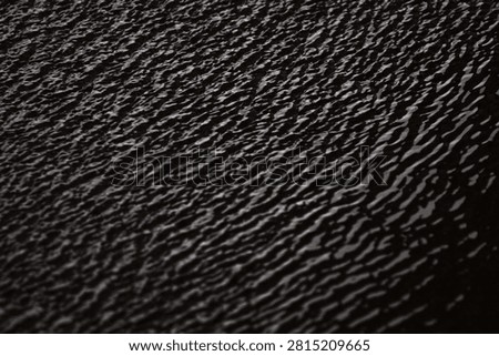 Wavelet on a puddle during a storm