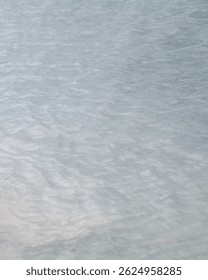 Wavelets on sea surface. Blue water.