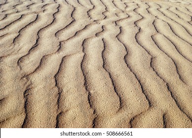 Wavelike Ripples Of Sand