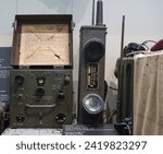 Wavemeter Class D No. 1 MK.2 and American Army Radio Transmitter BC-611-B. The SCR-536 self-contained two-way radio or “handie talkie” widely used in the Army.