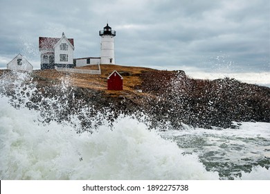 Waves Break Around Nubble Lighthouse After Winter Storm In Maine