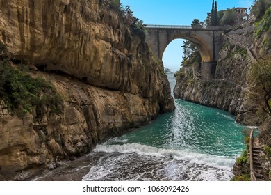 Waves Break As The Sea Enters The Fjord At Fiordo Di Furore On The Amalfi Coast, Italy